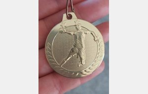 Médaille offerte par les entraîneurs aux -13 G